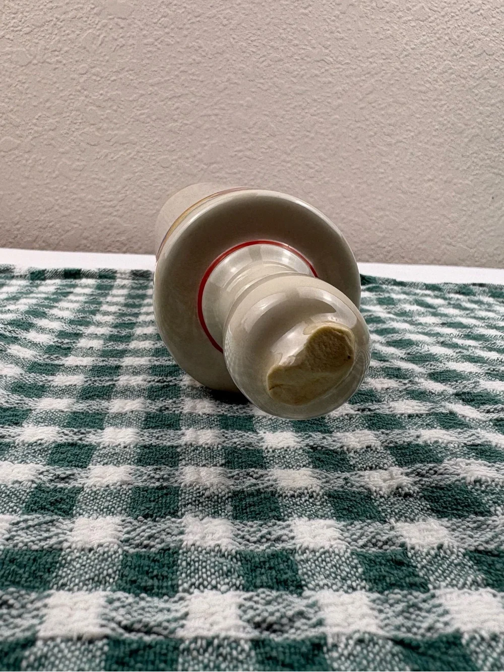 Vintage Harker pottery ceramic rolling pin decorated with a fruit pattern